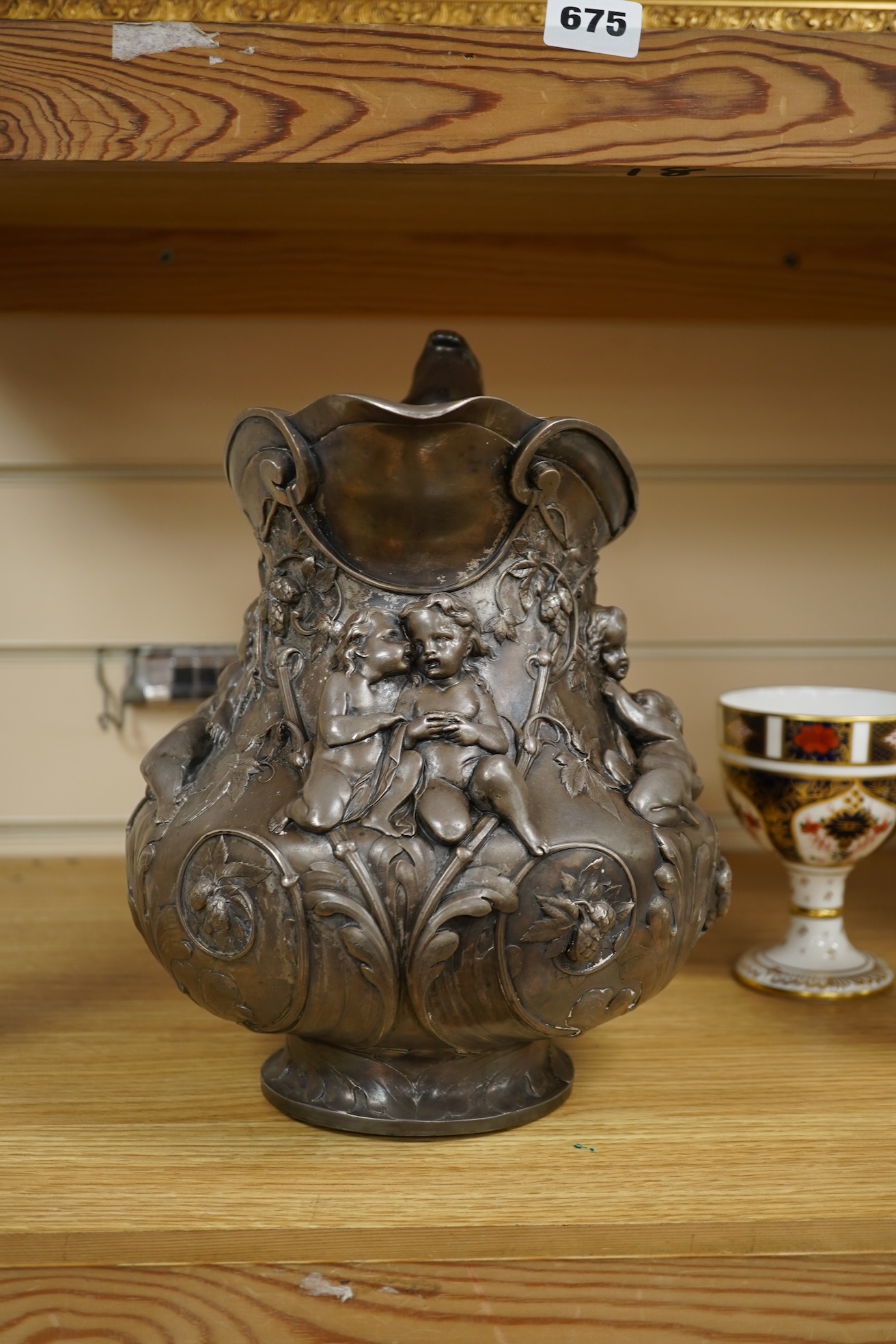 A large Victorian electrotype silver plated jug, in the manner of Elkington & Co., 28cm